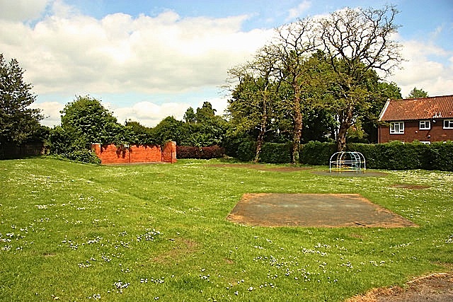 Wickham Gardens, near Lincoln, by Richard Croft.  He wrote:  "Sadly, the pavilion has lost its roof and the playground almost completely denuded of all play equipment, condemned by health & safety concerns. I played here for countless hours as a boy in the 1960s and I wonder what the future holds for Wickham Gardens playground."